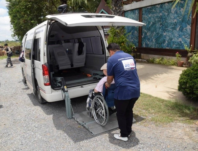 Inclusivan van exterior showing wheelchair accessibility branding