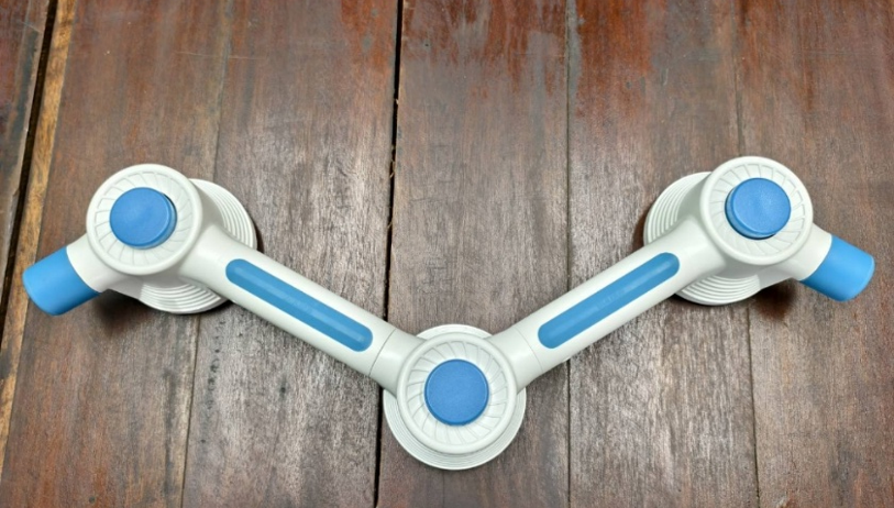 V-shaped shower grab bar with three blue suction cups, top view